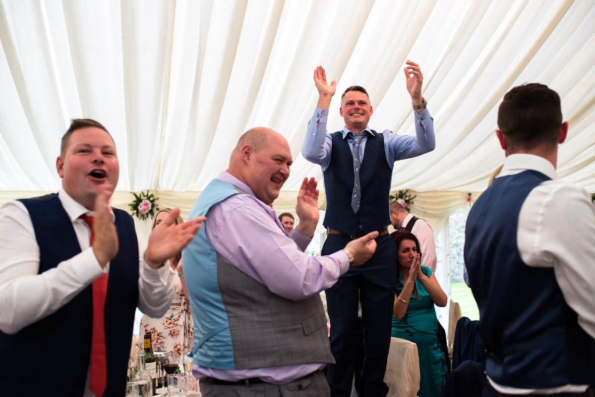 Photograph of Paul and Lexy's wedding guests at their Kent wedding at Allington Castle