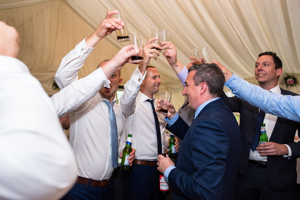 Paul and his friends celebrate with drinks on his wedding day in Kent