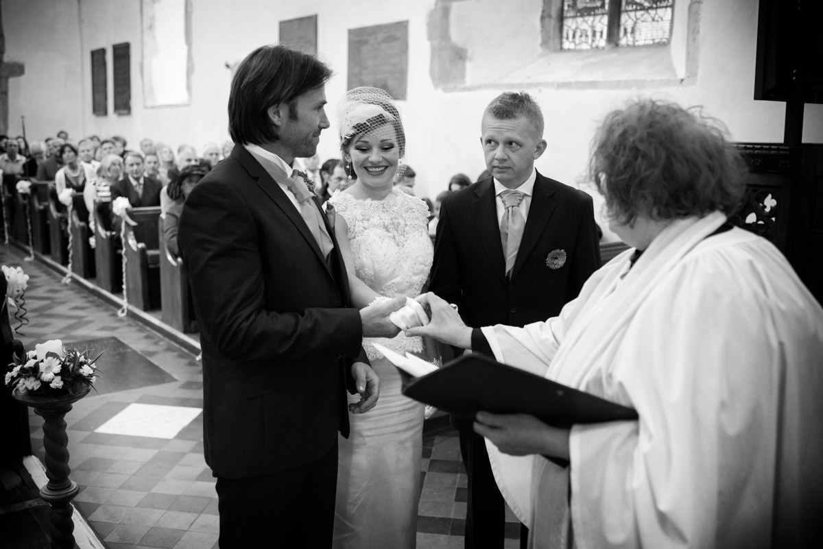 Black & white photograph of Anias brother giving her away in Kent church wedding