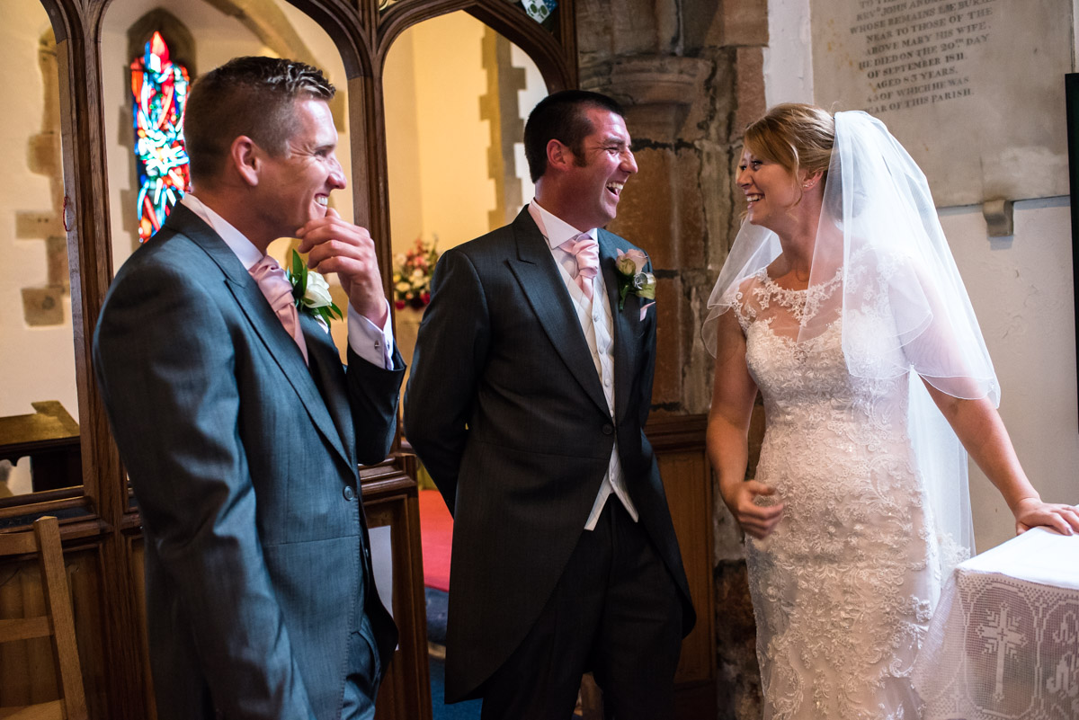 Photograph of Kif and Becky after signing the wedding register in Marden Church in Kent