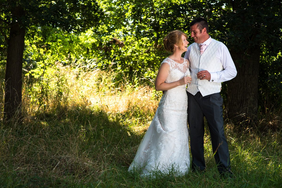 Photograph of Kif and Becky on their wedding day in their farm woods in Marden Kent