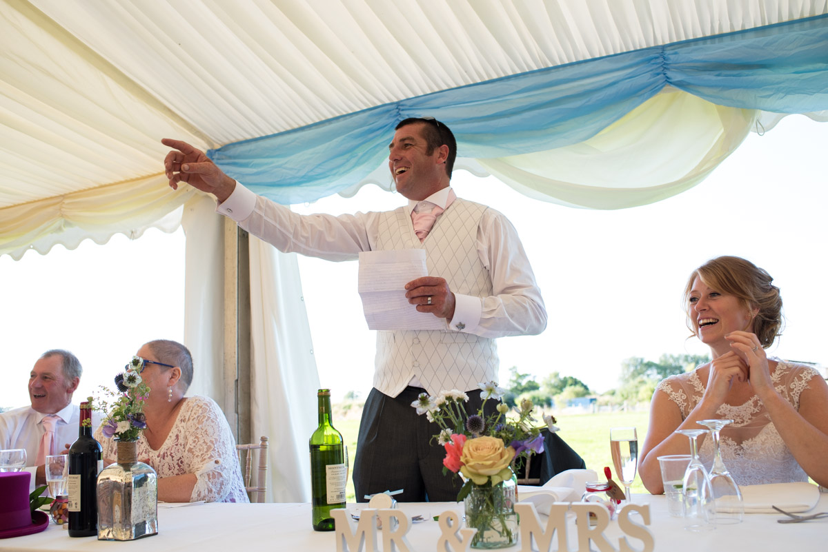 Kif is photographed making his wedding speech
