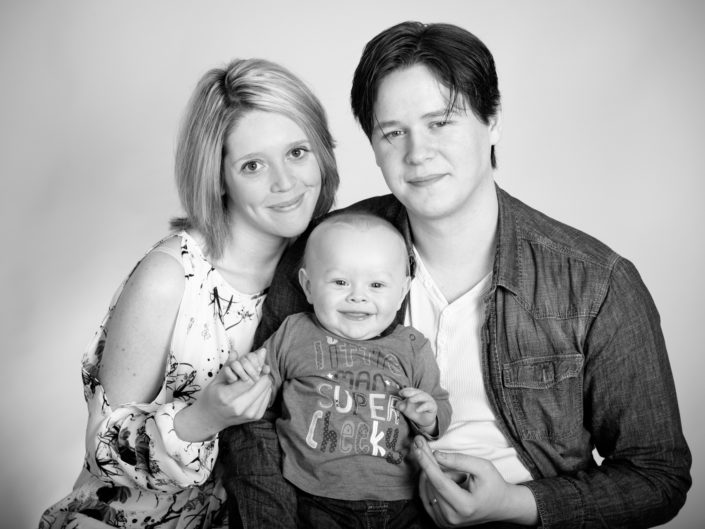 Black and white studio portrait photo of Brignell family