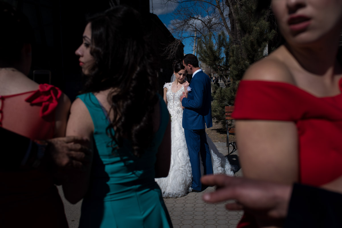 outside church in gyumri in armenia bride and groom are photographed after their wedding