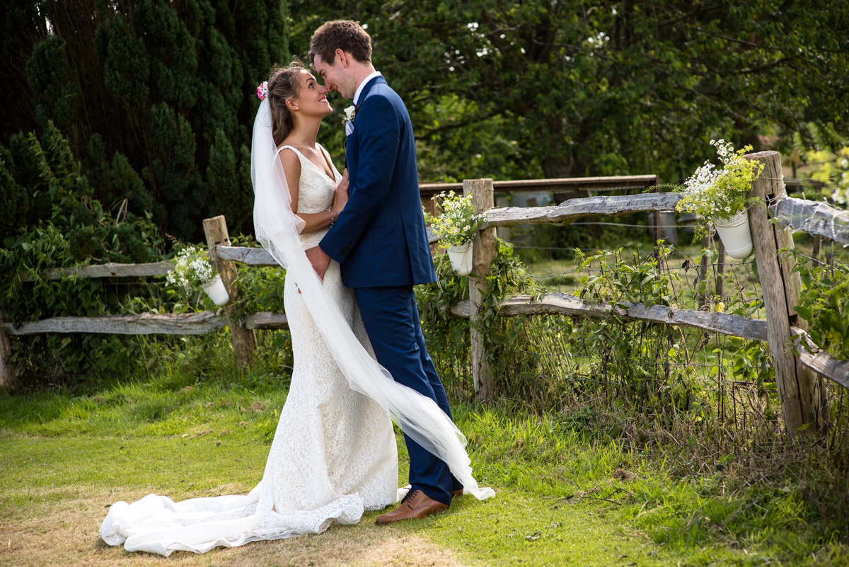 Photograph of Ellie and James at their reception venue in the Kent countryside
