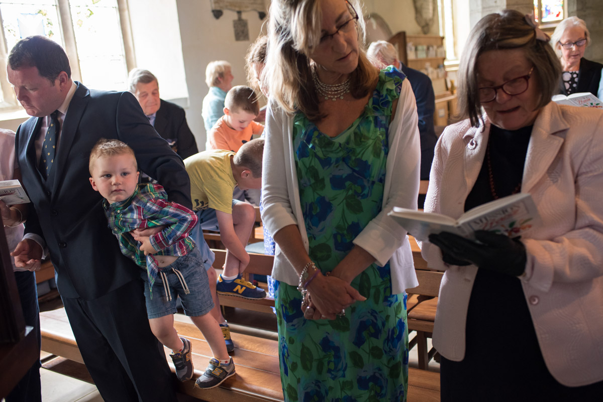 Guests photographed in Kent church during Christening of Edward