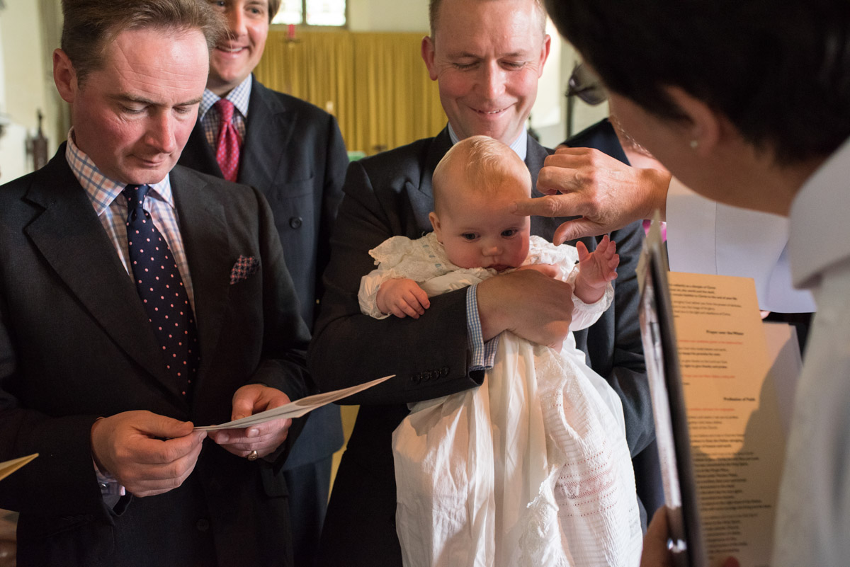 Photograph of Vicar blessing Edward during his Christening