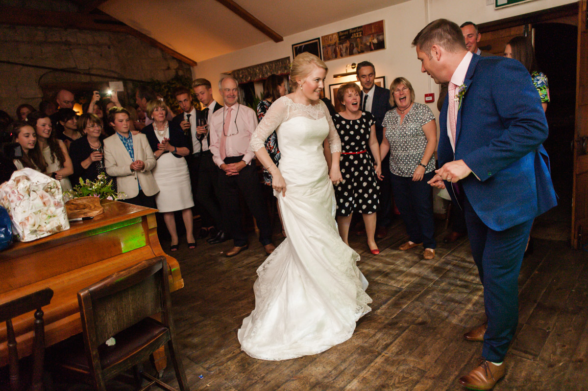 Andrea and Matthew photographed doing first dance at their Kent pub wedding reception