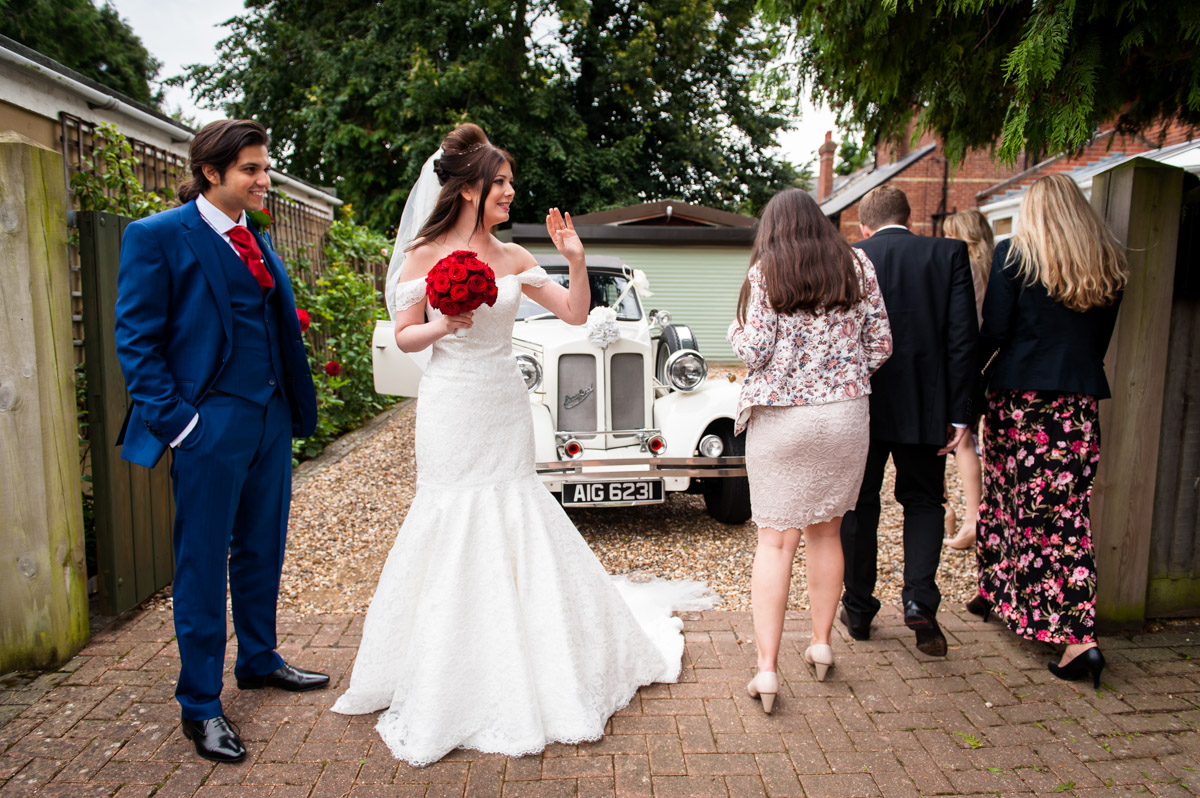 Photograph of Marianne and Sebastian arriving for their Kent wedding ceremony