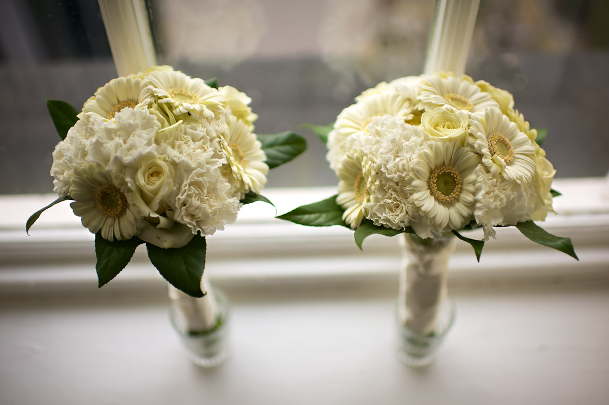 Anna and robes wedding bouquets are photographed together before their civil partnership in Greenwich