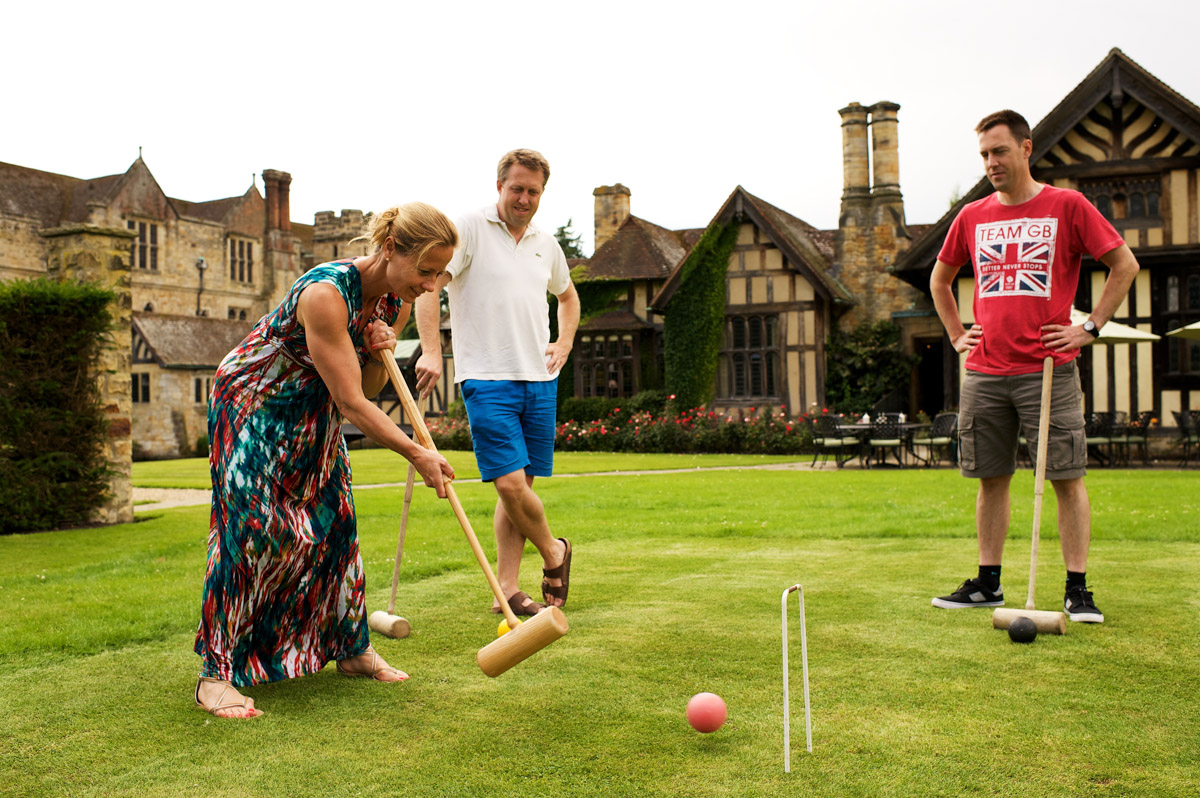 photograph of john playing croquet in ever castle grounds before his wedding ceremony