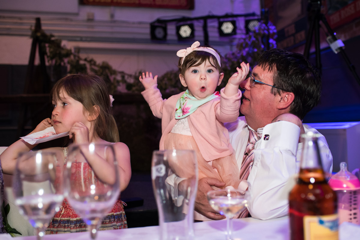 Mike and Louise's daughter pulls a face during the wedding speeches