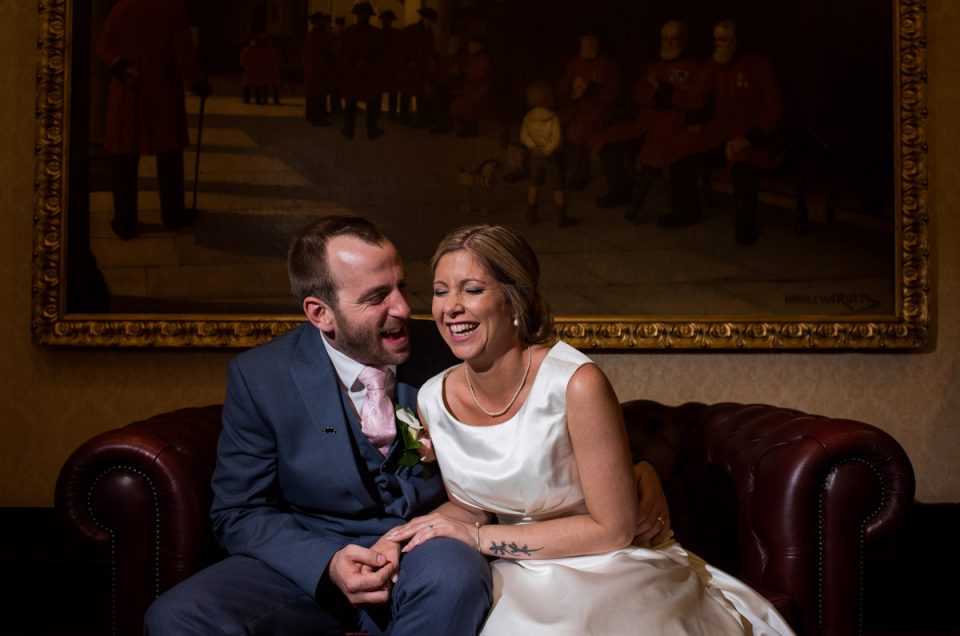 Louise and Mike share a laugh during their wedding portrait photograph session