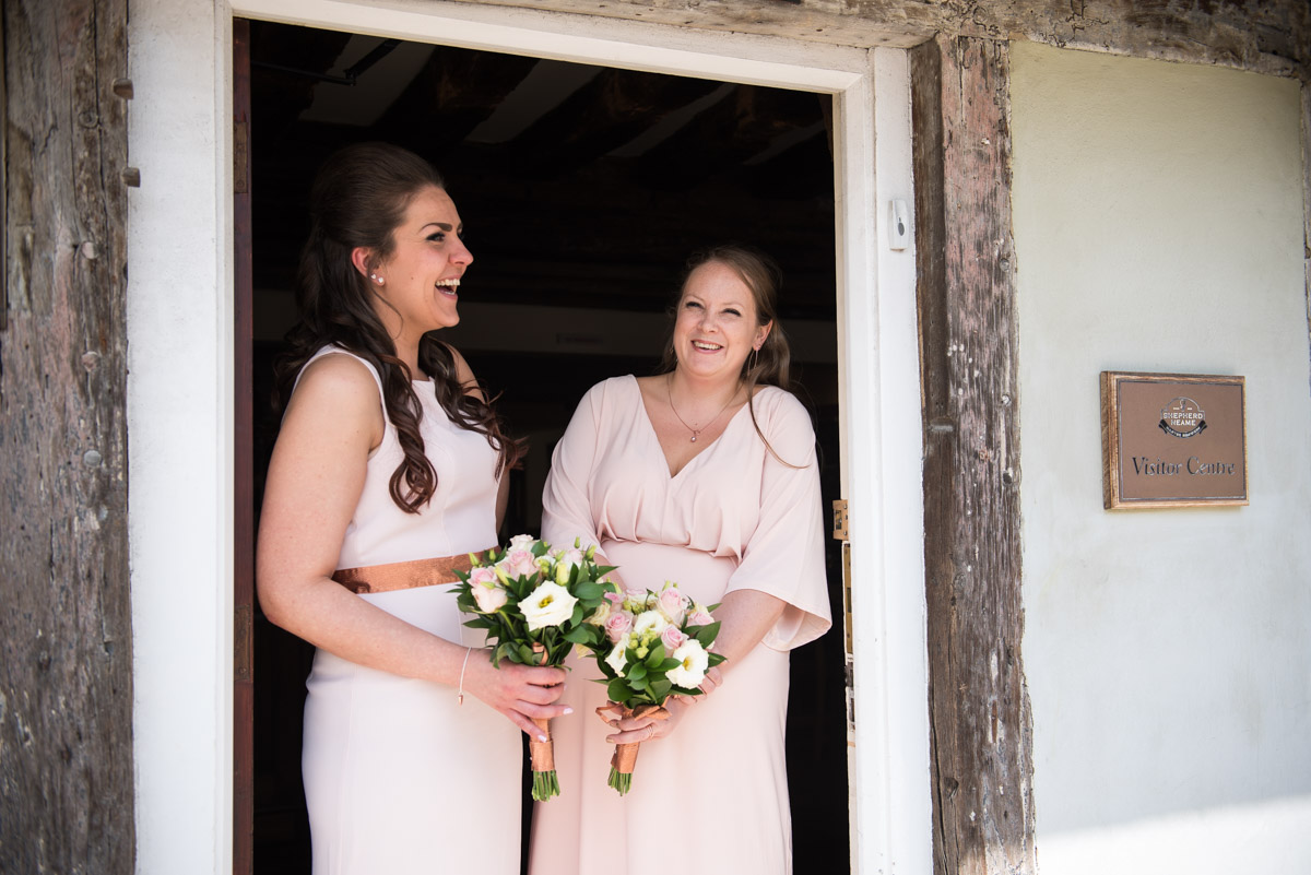 Bridesmaids photographed in the doorway to The Brewery Visitor Centre in Faversham Kent
