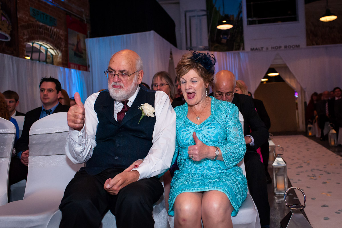 mum and dad gives the thumbs up on Laura and Daniels wedding day