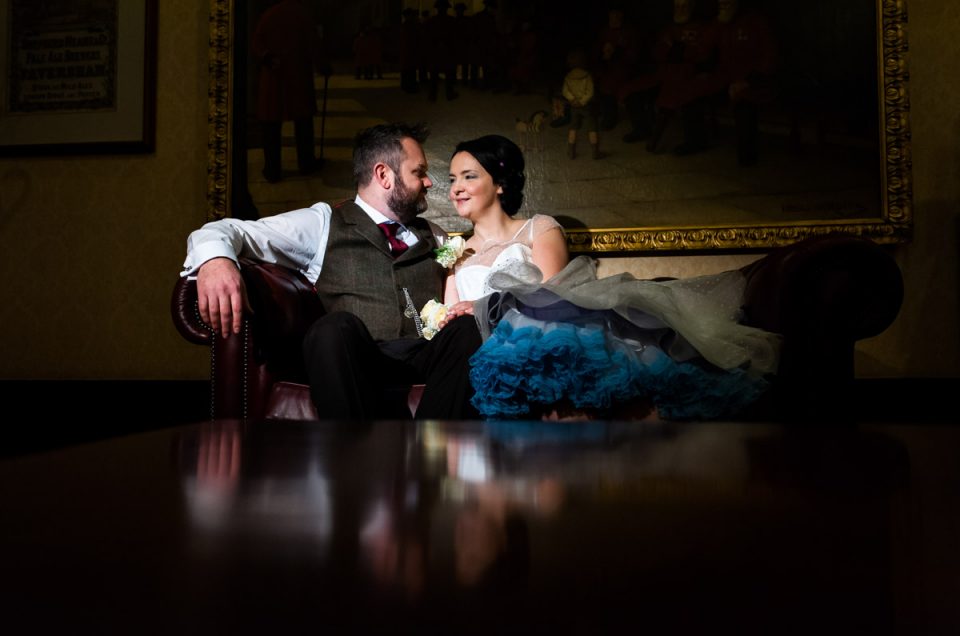 Photograph of Laura and Daniel in The Shepherd Neame Brewery visitor centre in Kent after their wedding ceremony