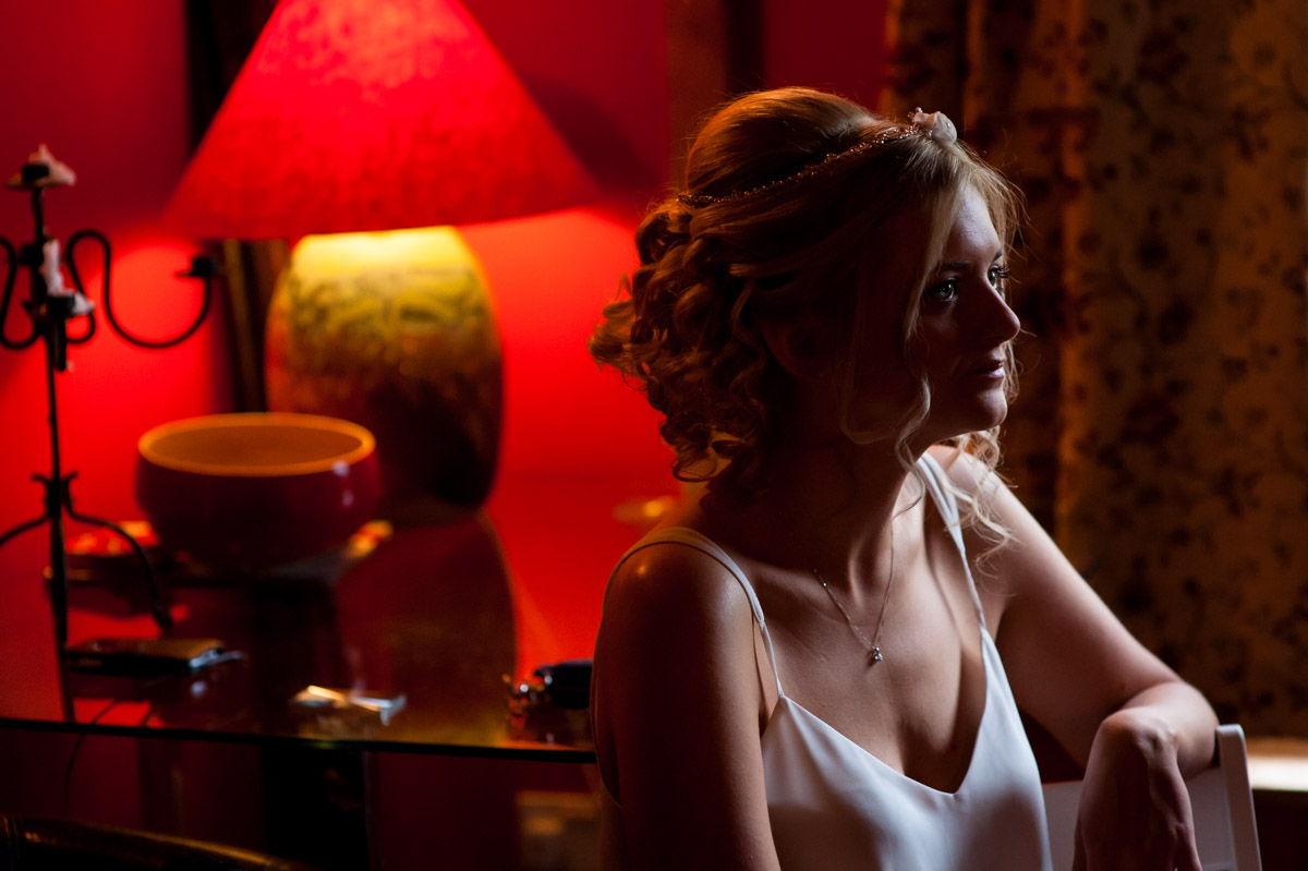 Sara photographed while getting ready for her wedding ceremony at The Lost Village of Dode in Kent