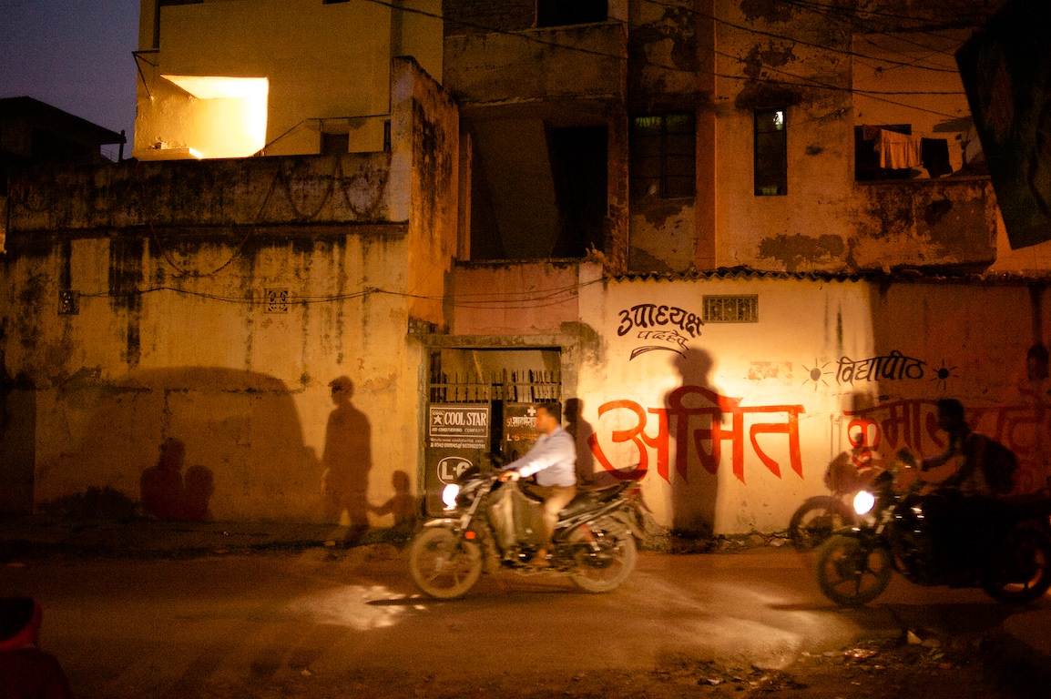 Photograph of my shadow and motorbike in India at night