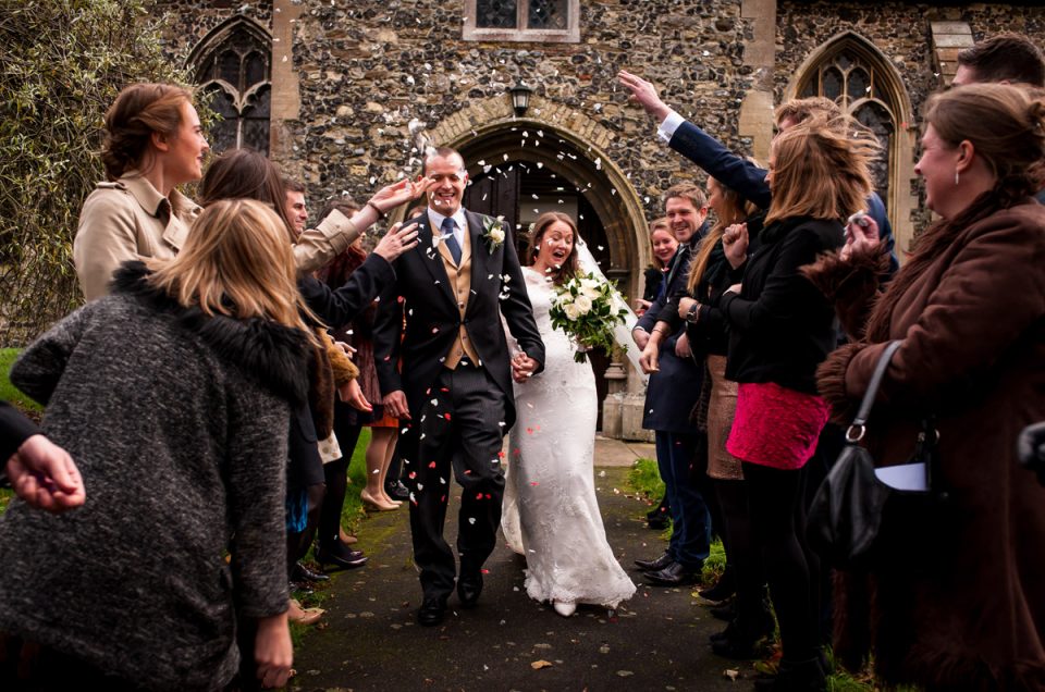 Confetti throwing after Emma & allies Kent wedding ceremony