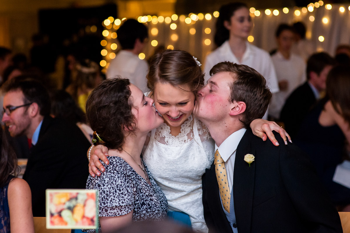 Abigail is kissed by wedding guests at Kent reception