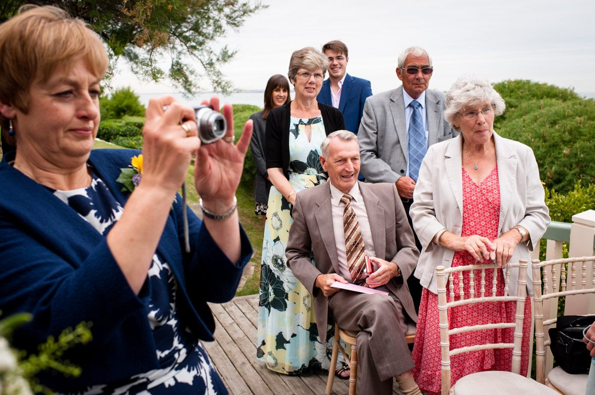 Emma and Andys wedding guests photographed at the Beacon house wedding venue by the sea in whitstable kent