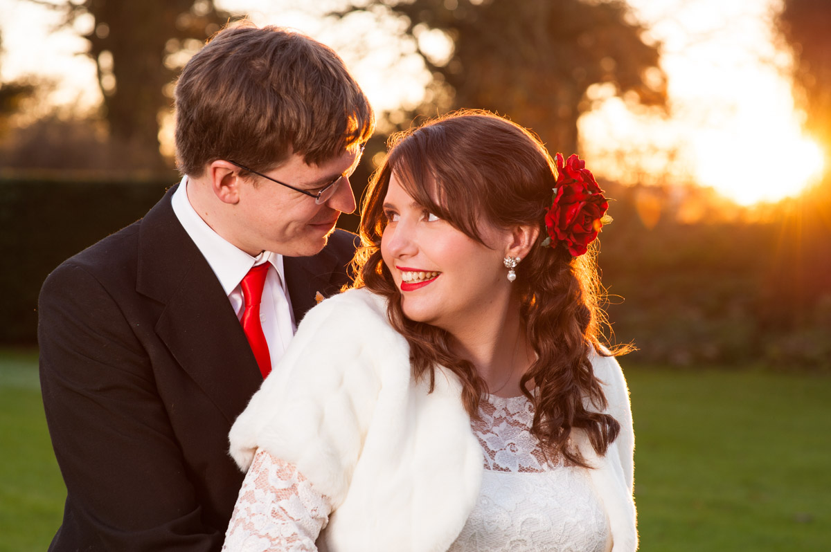 portrait photograph of mark and charlotte outside and sunset at nursed court on their wedding day