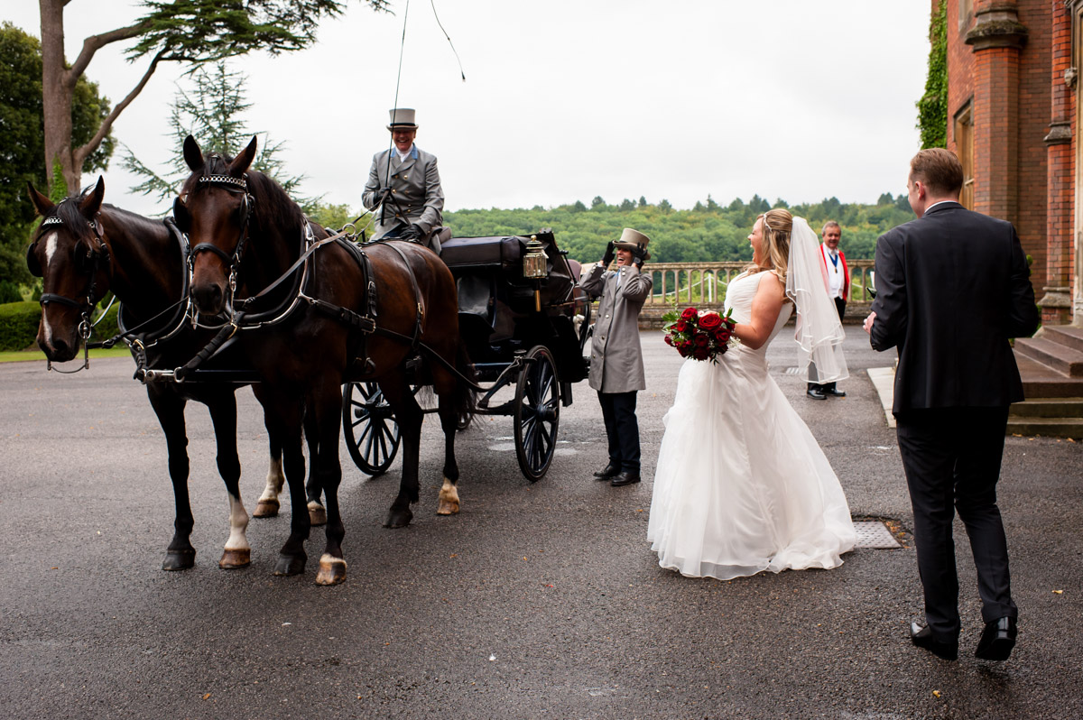 Bride and horse drawn carriage outside Latimer Place