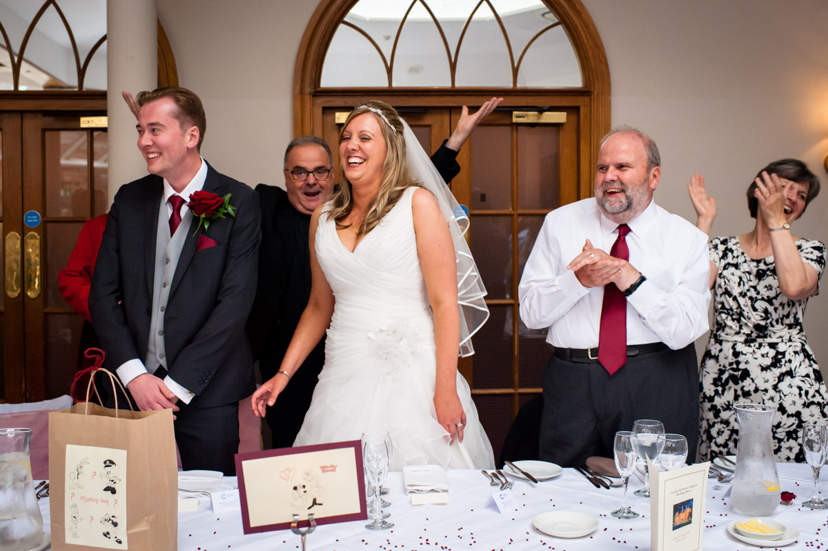 Bride and groom welcomed into their wedding reception at Latimer Place