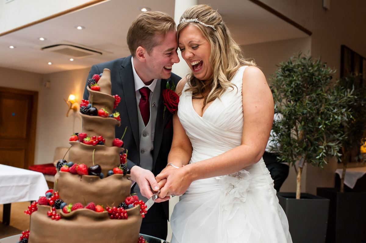 Photo of wedding cake cutting at Latimer Place wedding