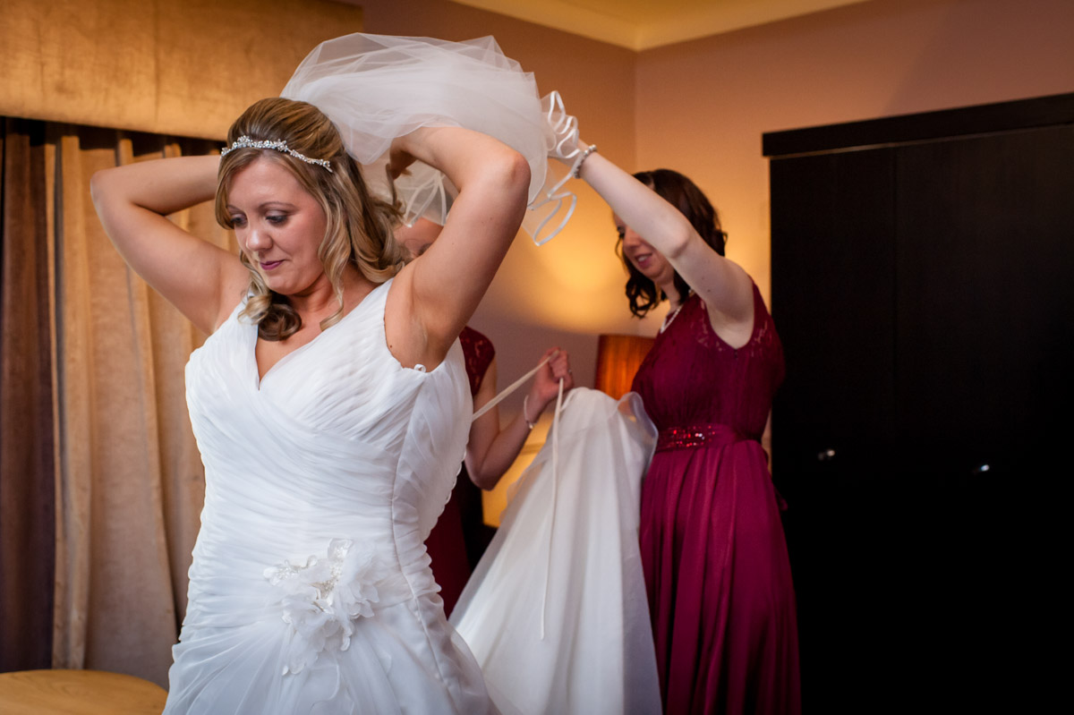 Bride and bridesmaids photographed while getting ready at Latimer Place