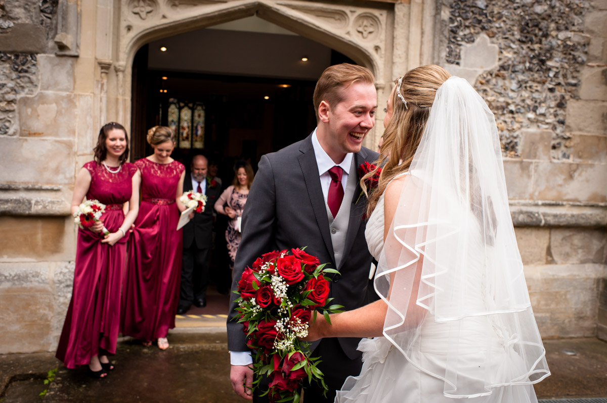 Photograph of bride and groom outside St Mary's Church, Chesham