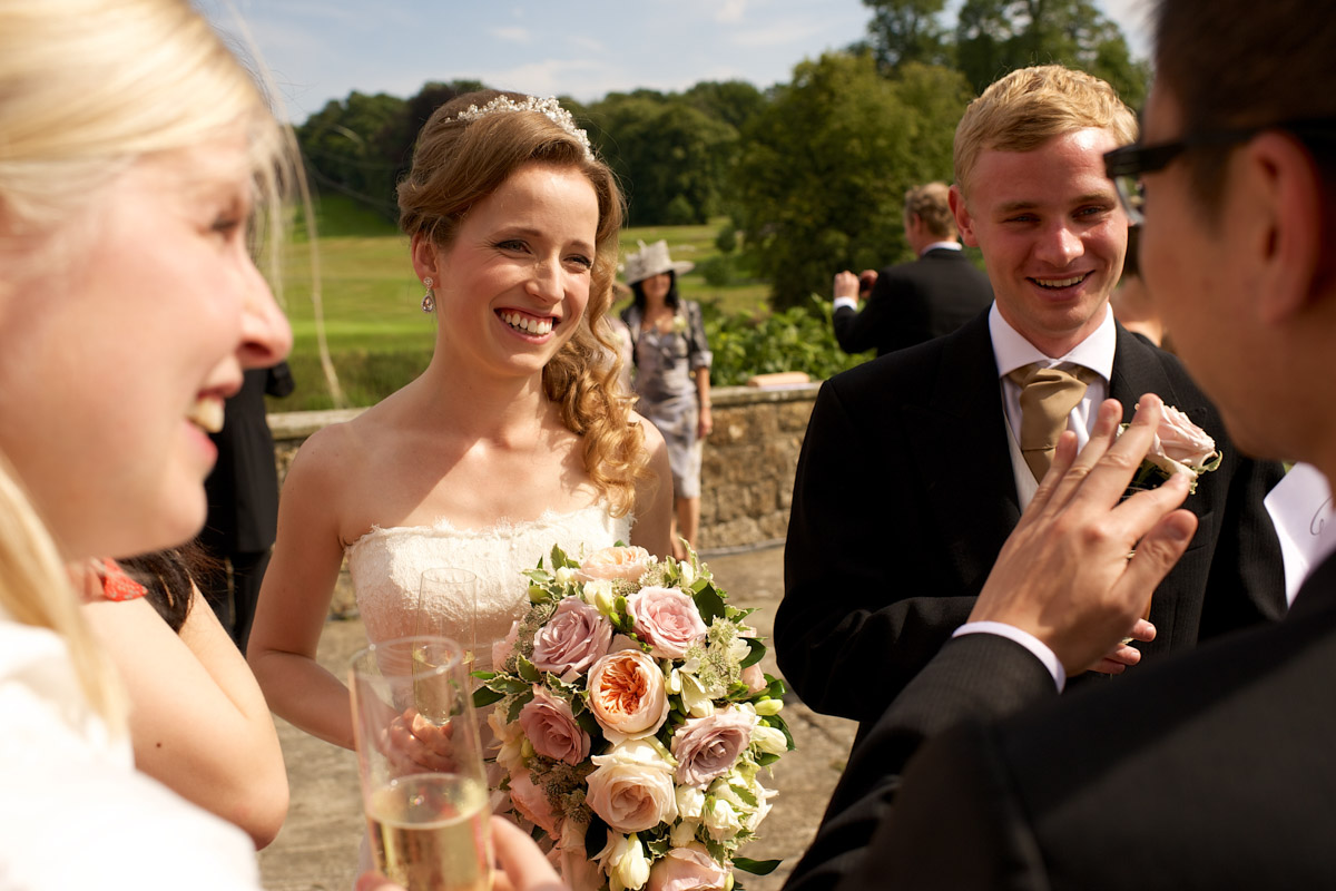 timea and edmund enjoy time outside on the grounds after their wedding ceremony at leeds castle
