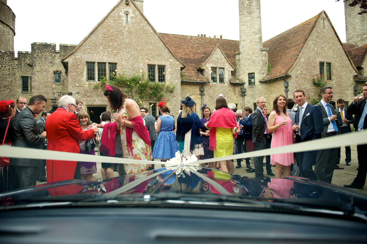Photograph of sarah and Leightons wedding guests from inside the car at Lympne Castle