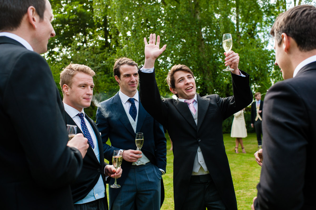 Wedding guests photographed at drinks reception in Petham Kent