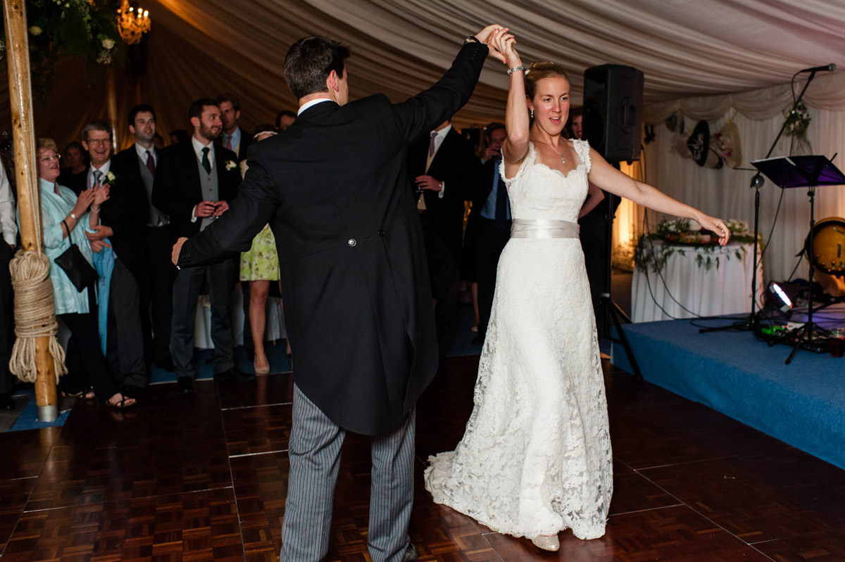 Nicka nd Olivia do their first dance at their wedding reception in marquee on Kent farm