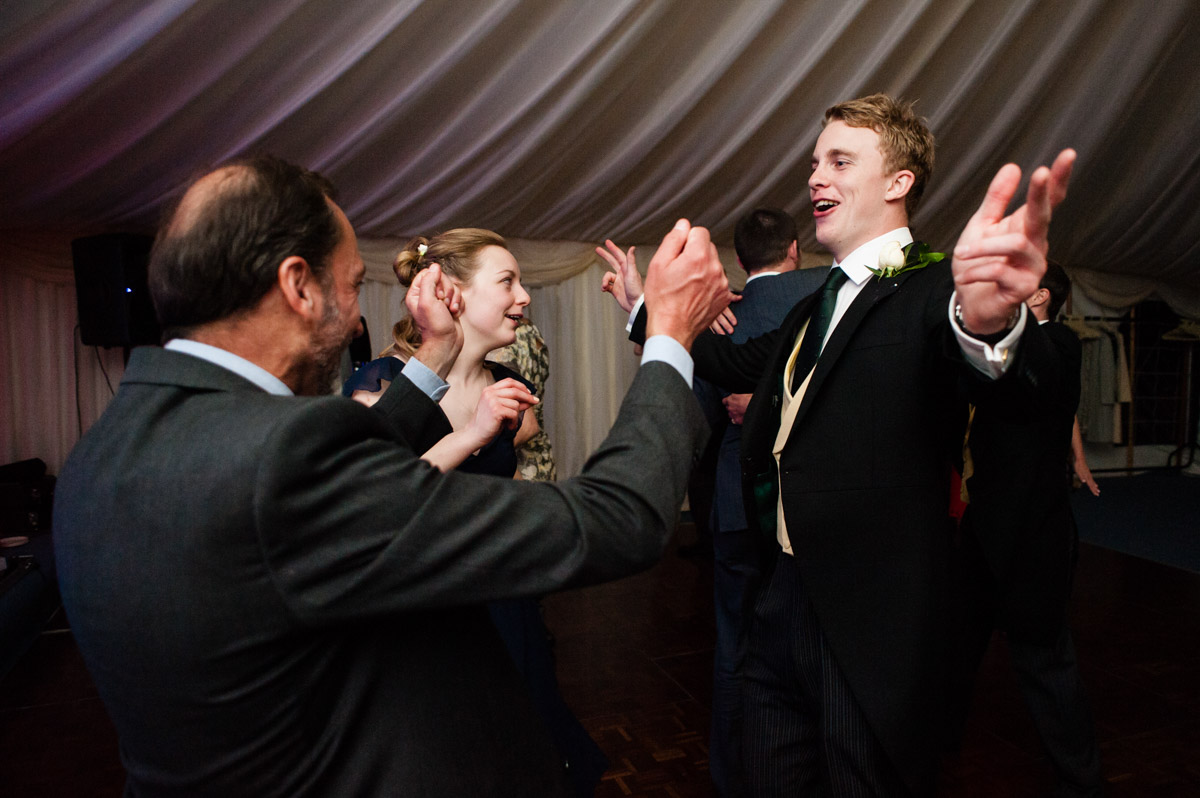Guest enjoy dancing at Nick and Olivias marquee wedding reception in Petham Kent