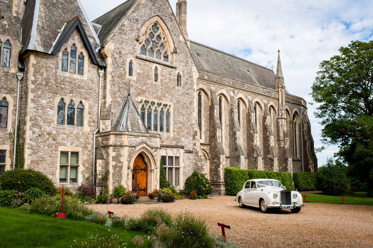 Rolls Royce wedding car leaving St Edmunds Chapel, Canterbury
