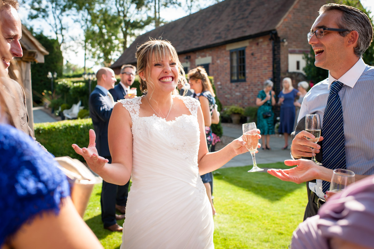 Bride enjoys time with friends on her wedding day at Winters Barn