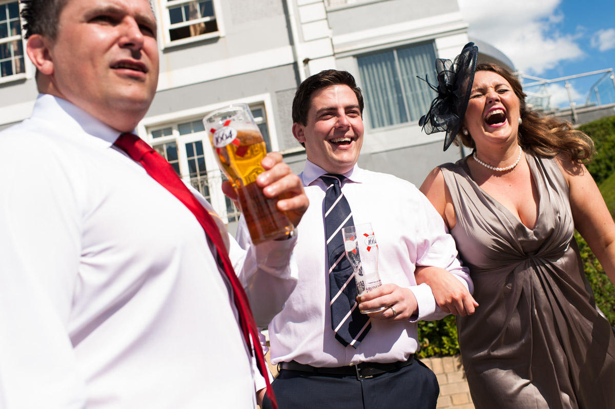 Wedding guests enjoy a drink at the Hythe Imperial before the wedding