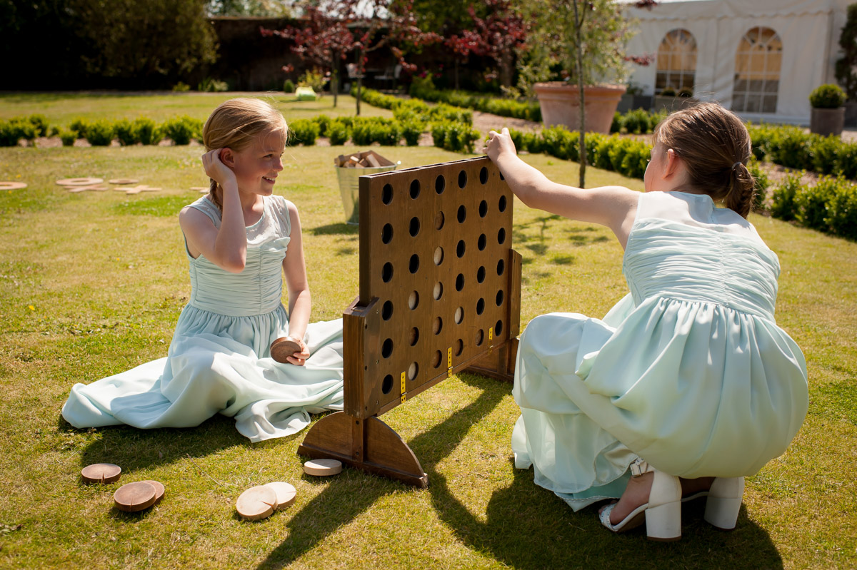 Children play outdoor games at The Secret garden wedding venue in Kent