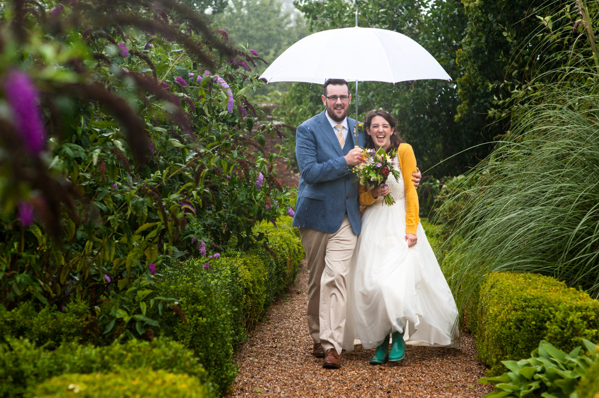 The secret Garden rainy wedding day photograph of Rachel and Daniel