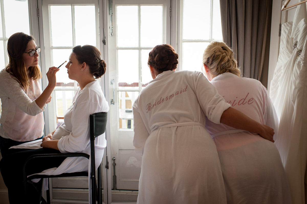 Bride and bridesmaids getting ready for Laurens wedding at Whitstable Castle on Kent coast