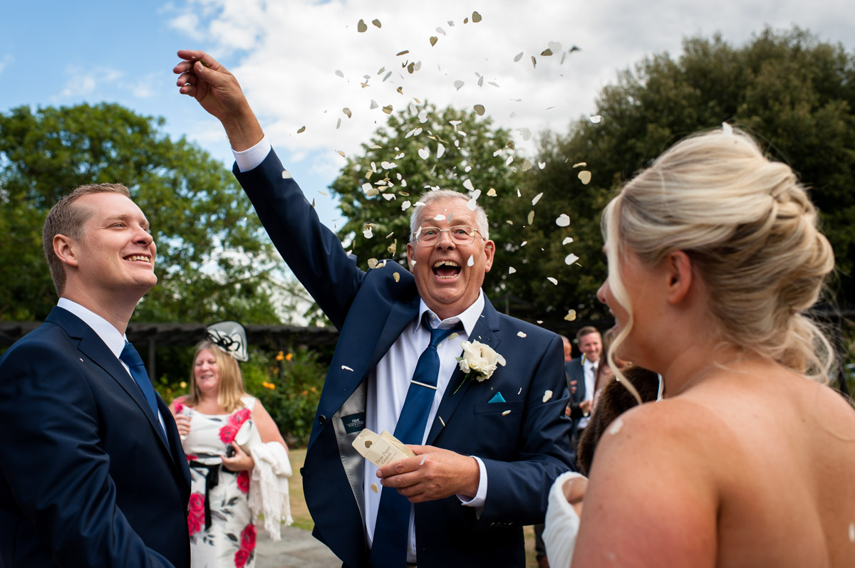 Laurens dad throws confetti their kent wedding ceremony at whitstable castle