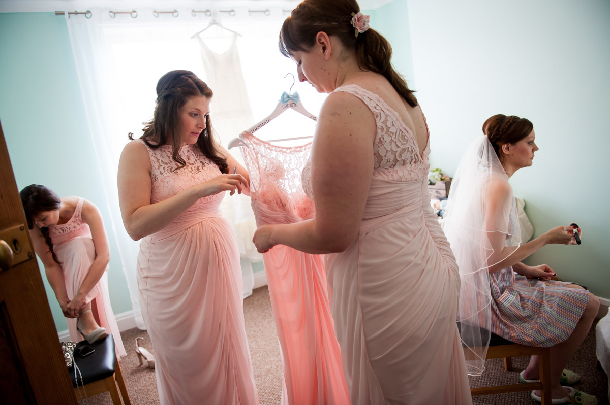 bridesmaids change into their dresses before gaby and marks wedding
