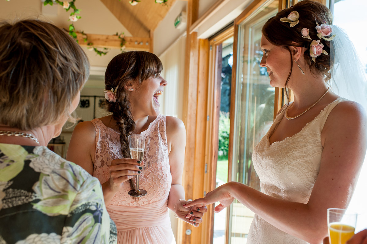 bridesmaid looks at gaby wedding ring