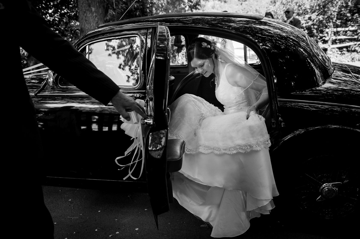 gaby is photographed getting out of the car for her church wedding ceremony