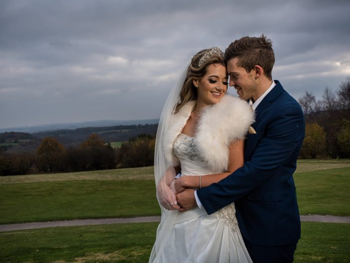 Jade and Stuart are photographed during the Kent winter wedding at Dale Hill golf course in Kent
