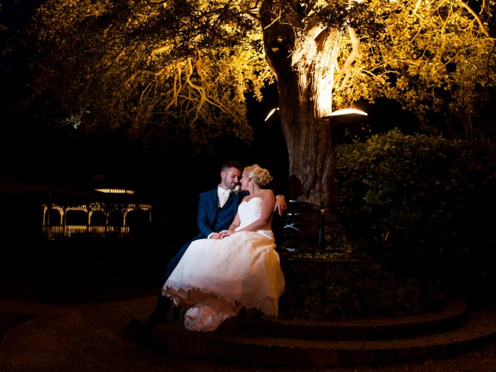 Evening flash lit photograph of Juliet and Jason at their wedding at The Old Kent Barn in Kent