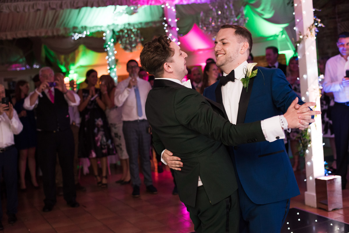 David and Simon photographed during their wedding first dance in Kent