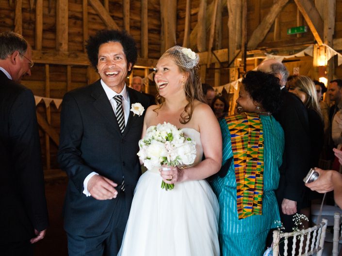 Photograph of couple after their Kent barn wedding ceremony